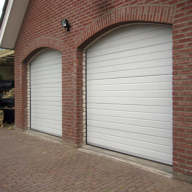 White anti pinch hand garage door
