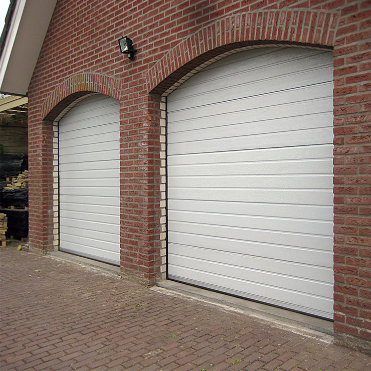 White anti pinch hand garage door