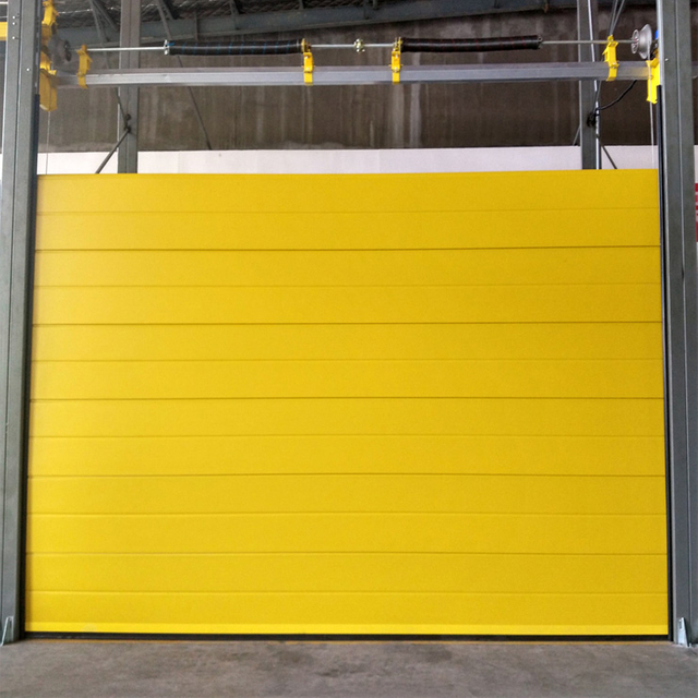 Yellow sectional industrial door
